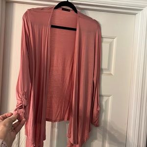 Dusty rose fashion jacket . 95% rayon 5% spandex . Super soft .